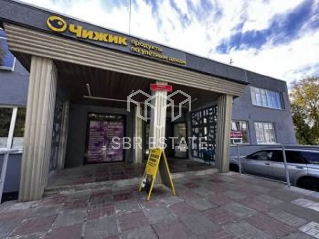 Продажа отдельно стоящего здания с арендаторами Чижик др.